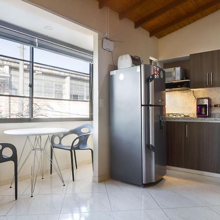 Апартаменты Poblado Brownstone Медельин Экстерьер фото