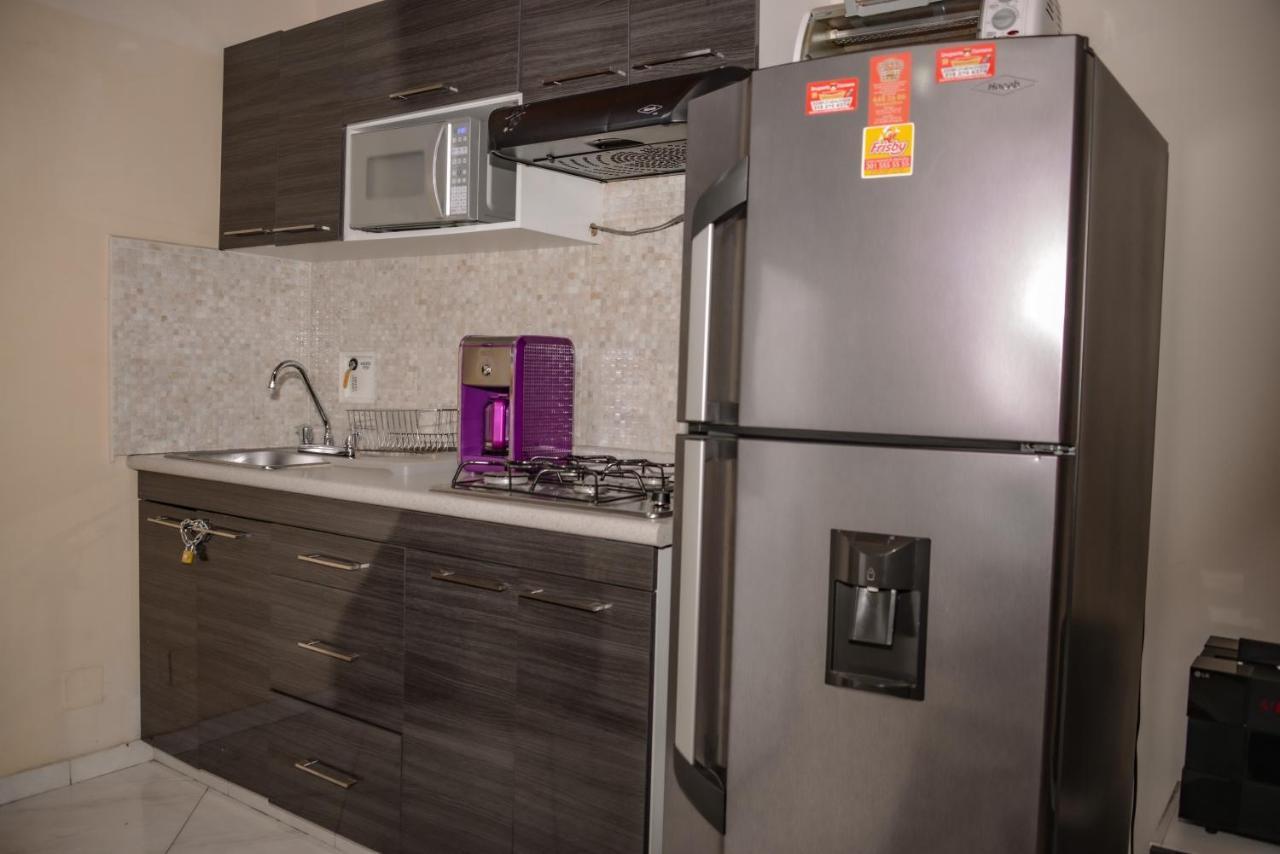 Апартаменты Poblado Brownstone Медельин Экстерьер фото