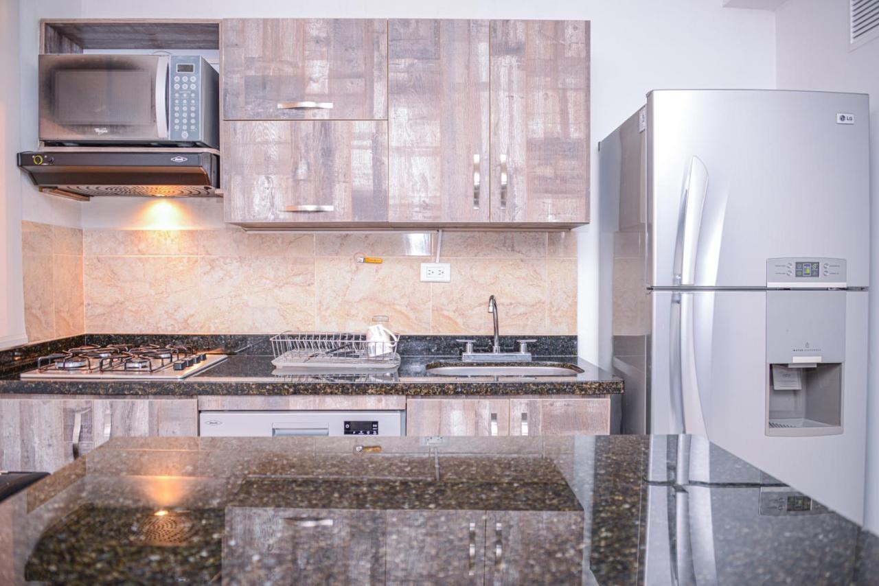 Апартаменты Poblado Brownstone Медельин Экстерьер фото