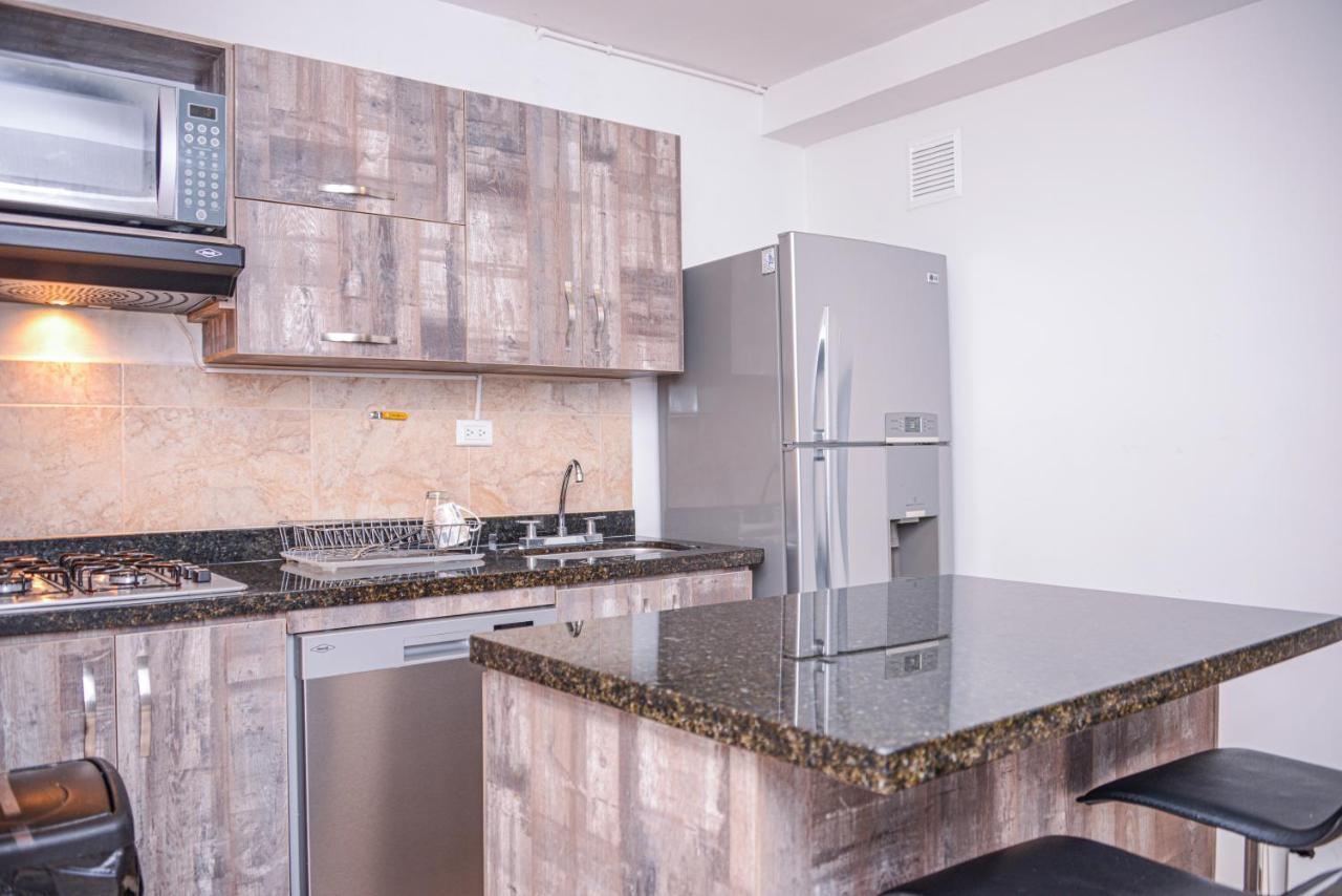 Апартаменты Poblado Brownstone Медельин Экстерьер фото