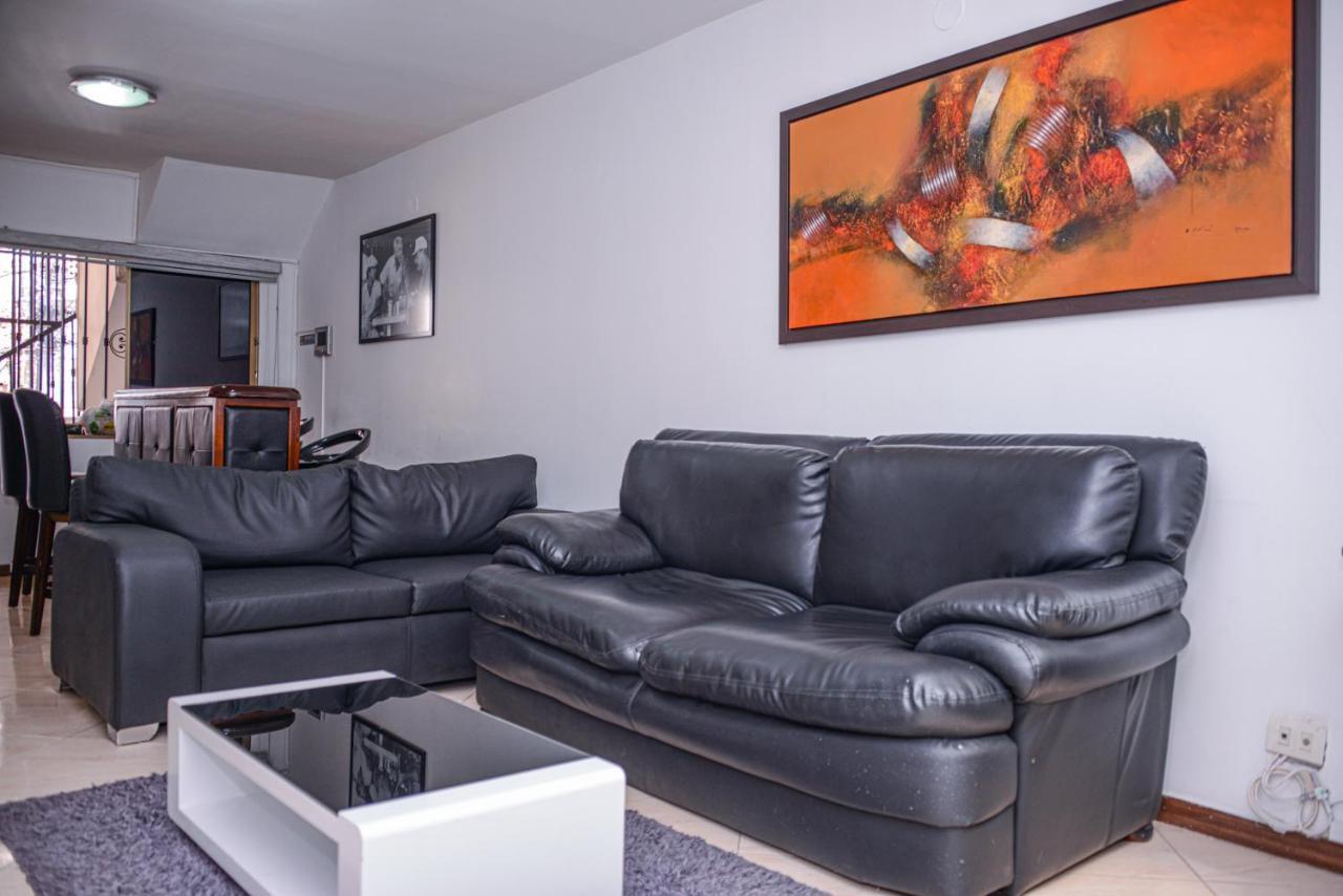 Апартаменты Poblado Brownstone Медельин Экстерьер фото