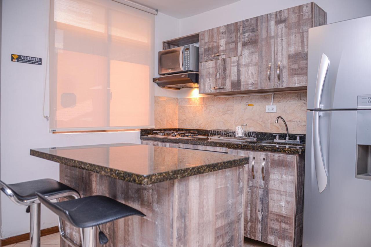 Апартаменты Poblado Brownstone Медельин Экстерьер фото